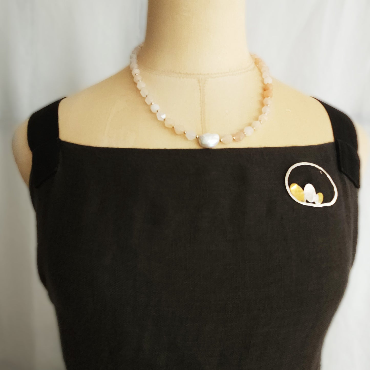 Silver brooch with tiny petals