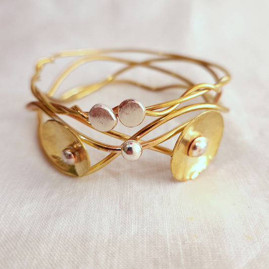 Silver and brass bracelet at O Gosh Shop