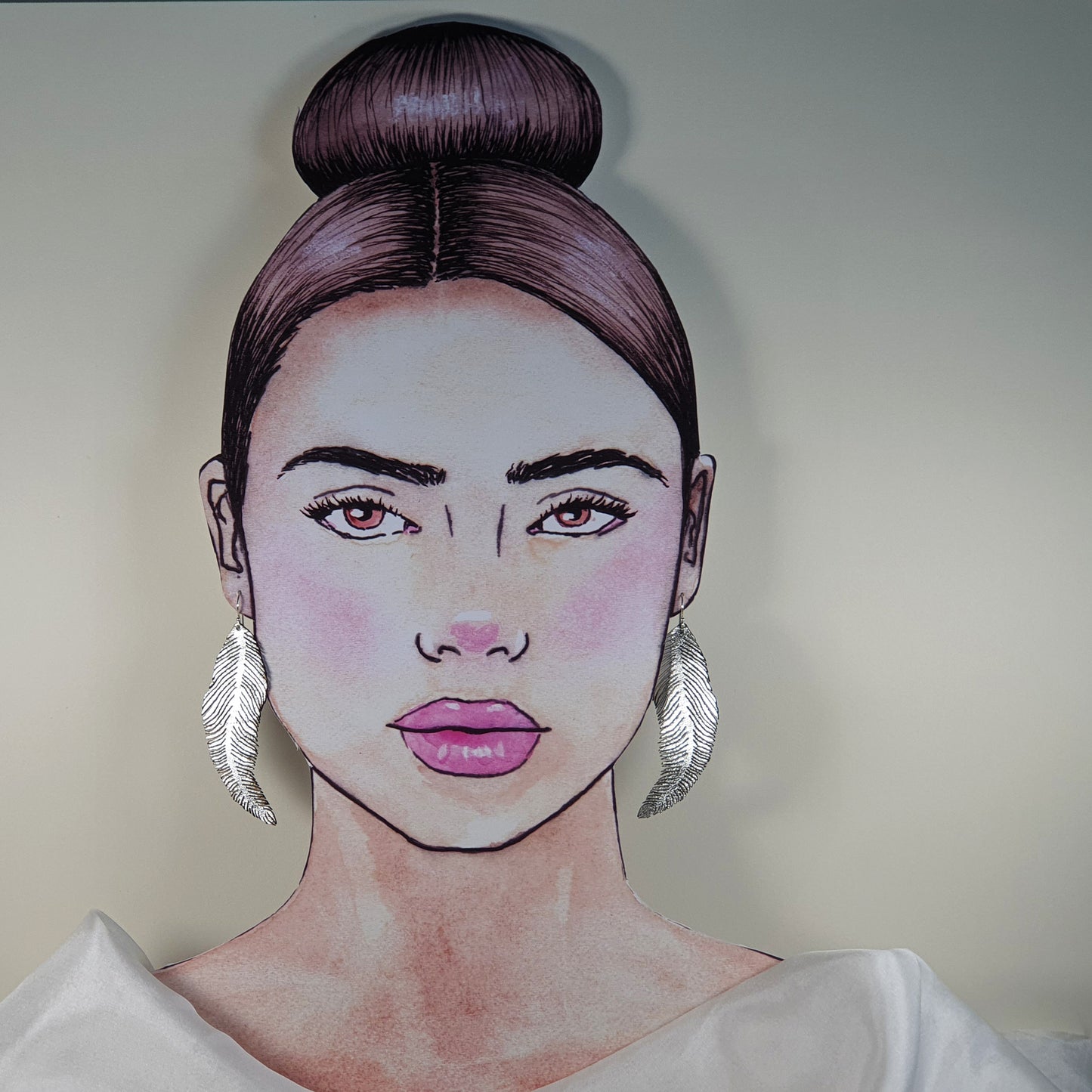 Silver feather earrings