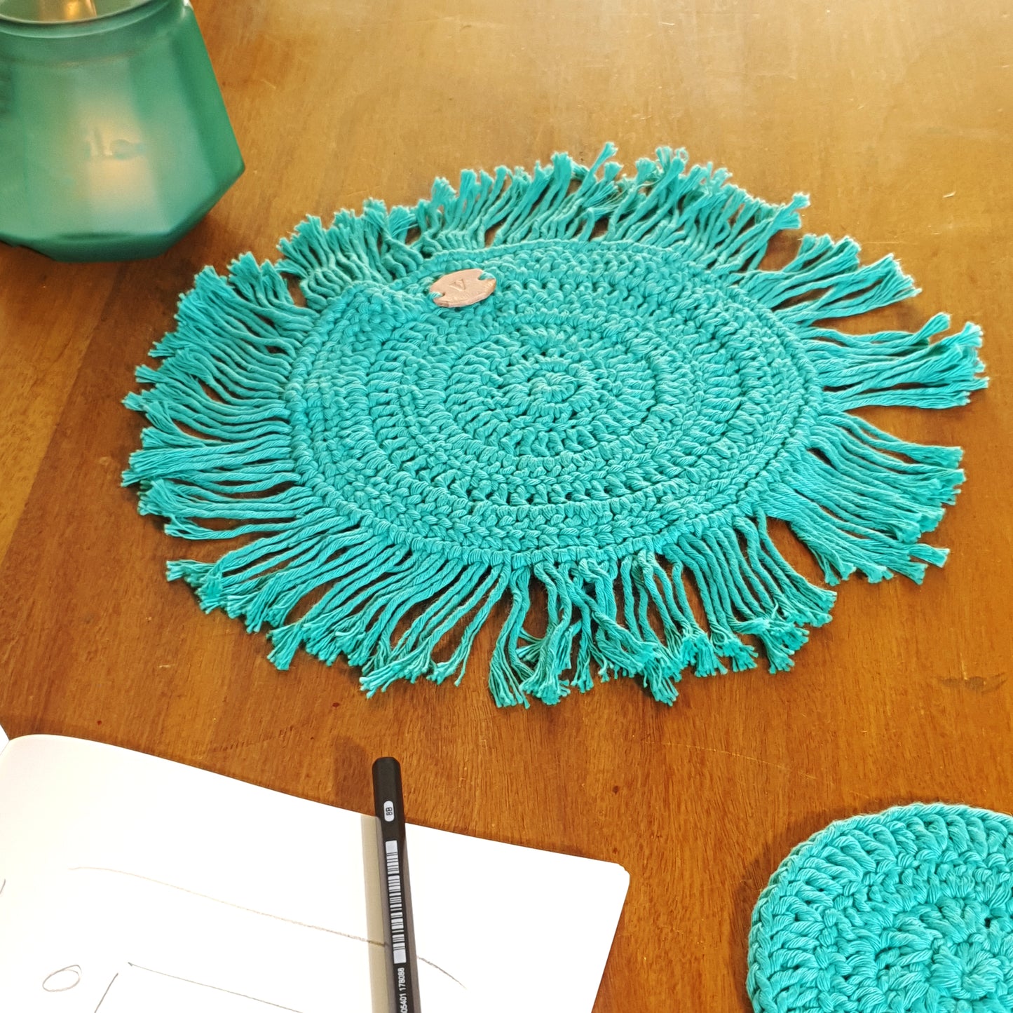 Colourful table set in crocheted cotton