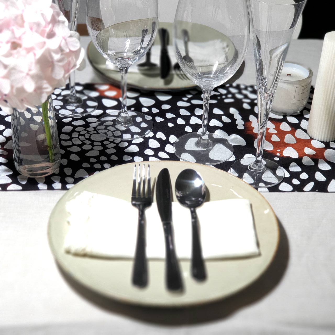 Dark Continent table runner in sustainable linen