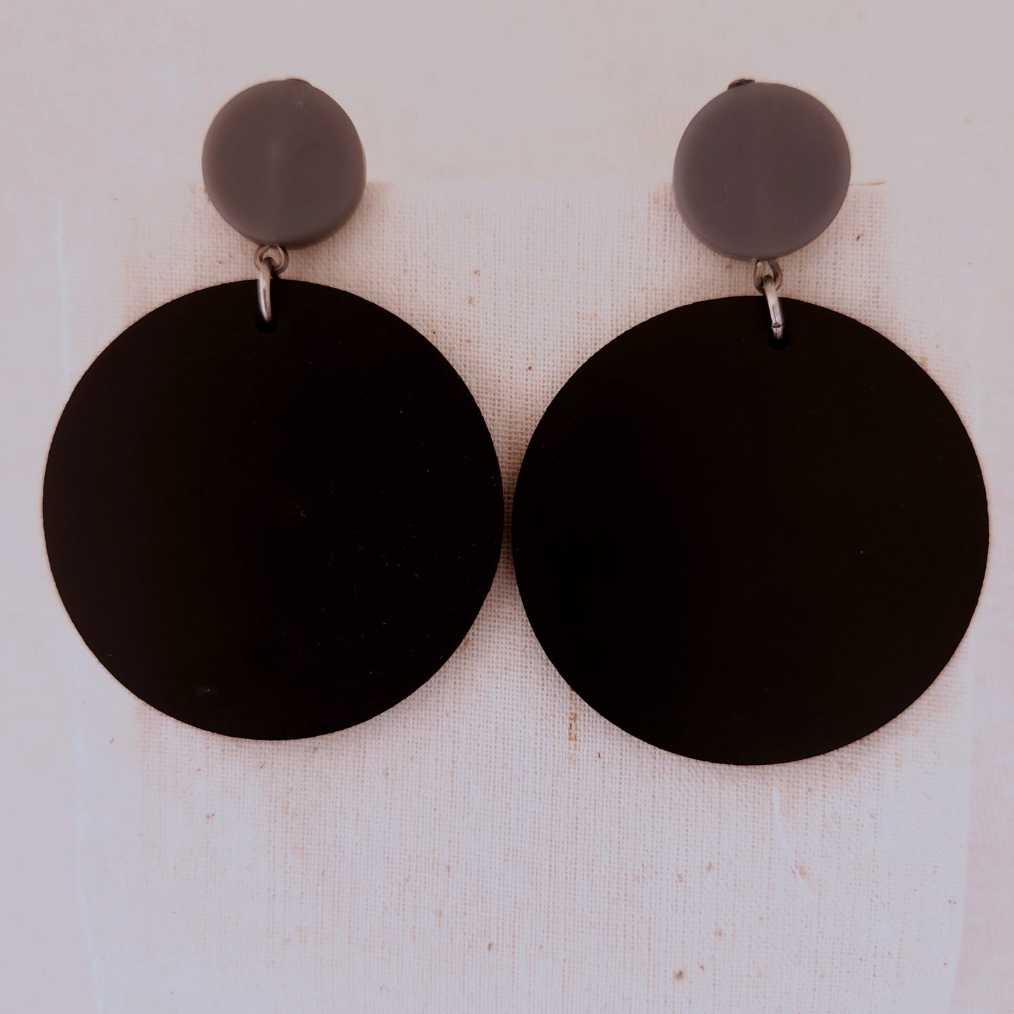 Rubber Disk Earrings by Frank Ideas