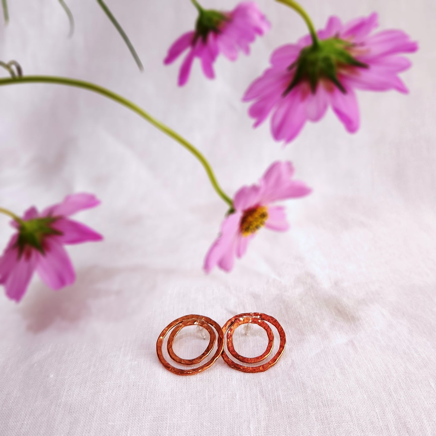 Shimmering beaten copper circle earrings