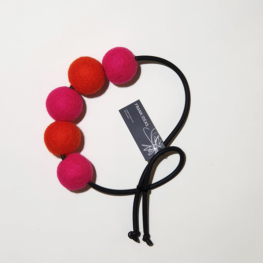 Pink and orange felt and rubber necklace