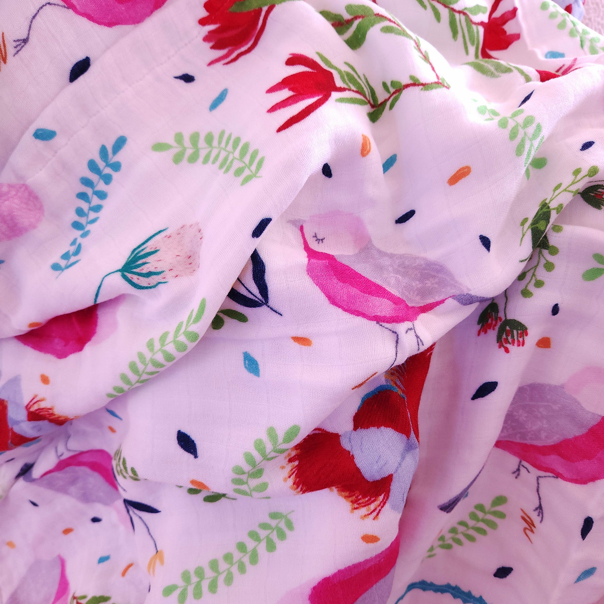 Organic swaddle blanket with birds and flowers