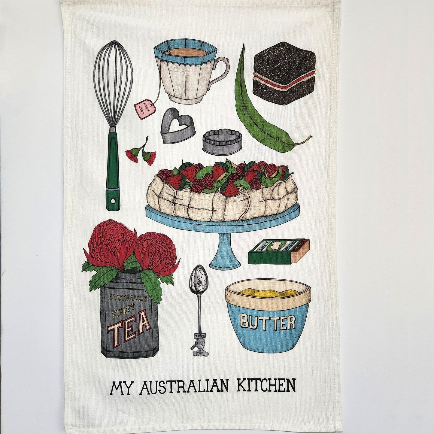 Quirky Australian tea towel illustrated with Australian kitchen items.