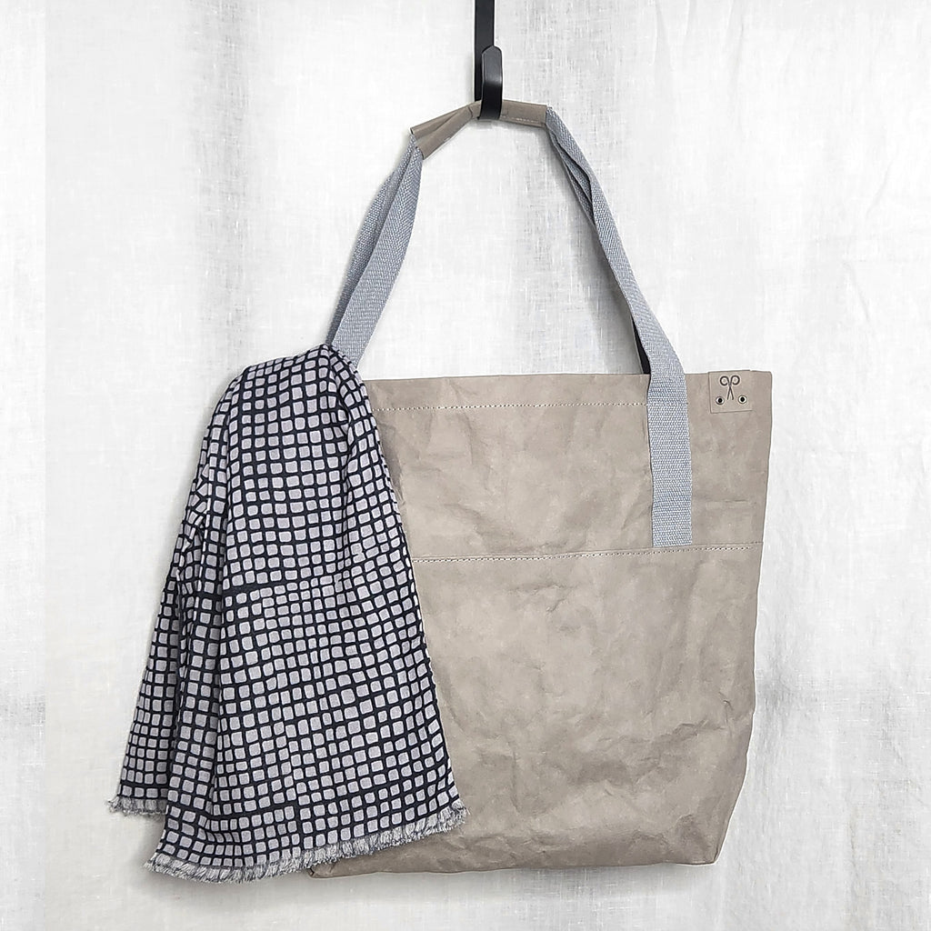Australian-made, stone-grey washable paper bag with a cotton scarf from O Gosh. 