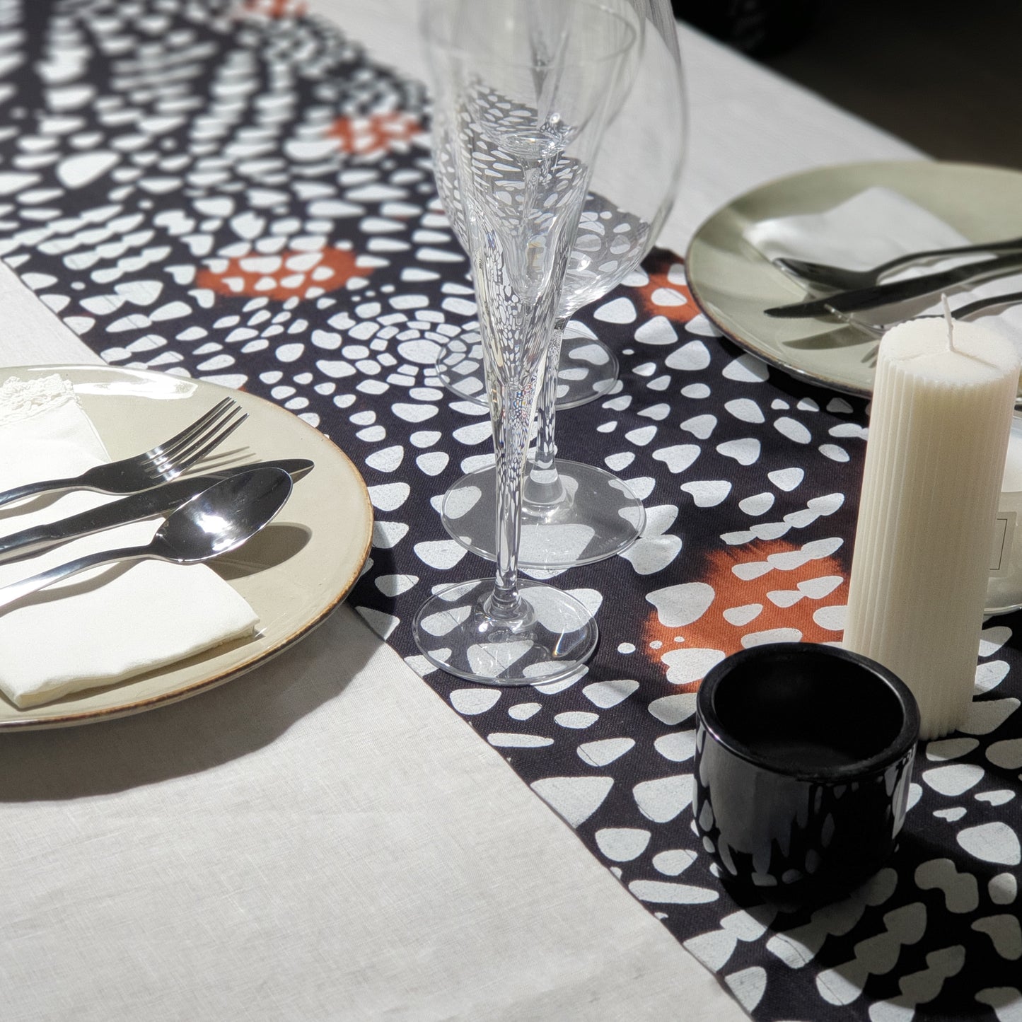 Dark Continent table runner in sustainable linen