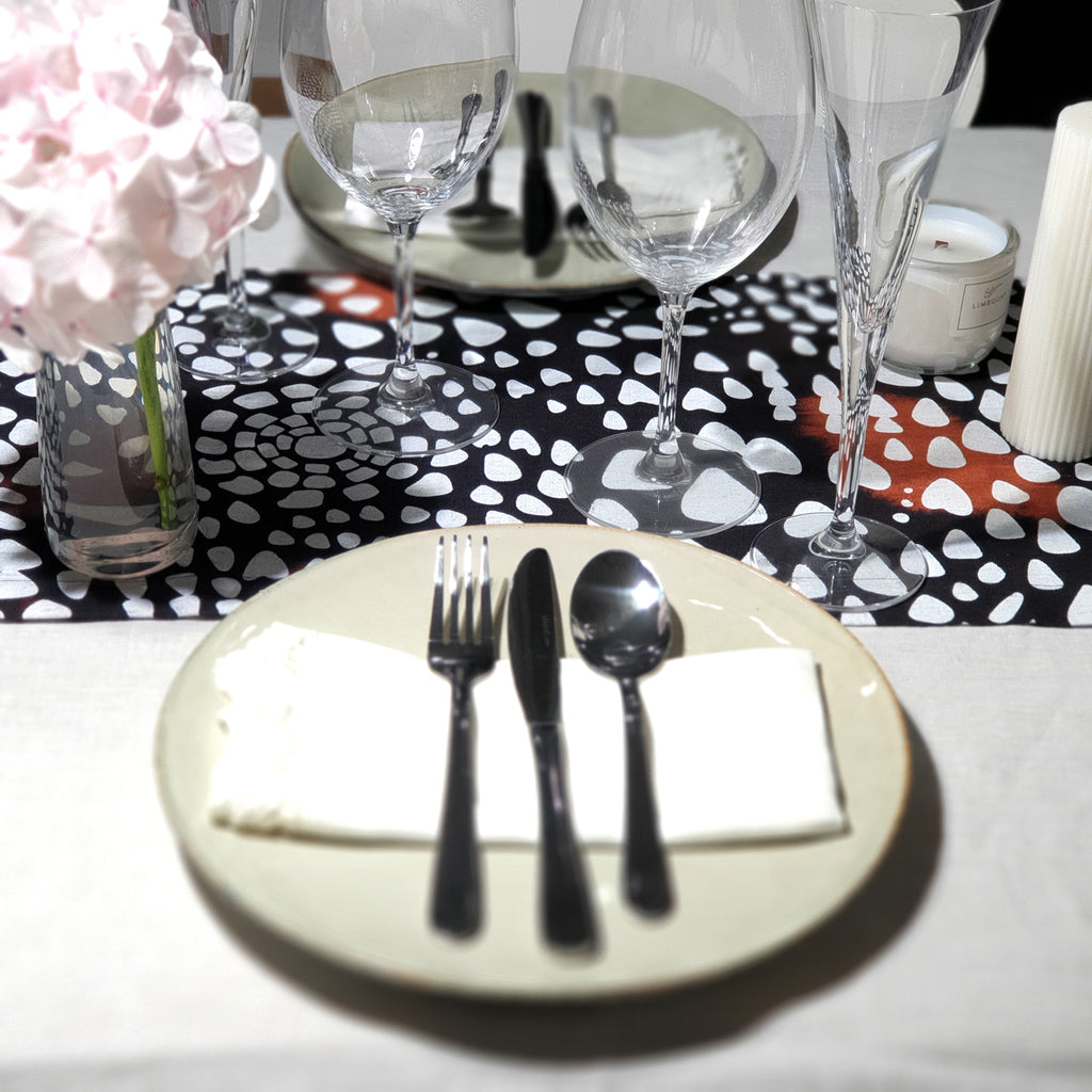 Dark Continent table runner in sustainable linen