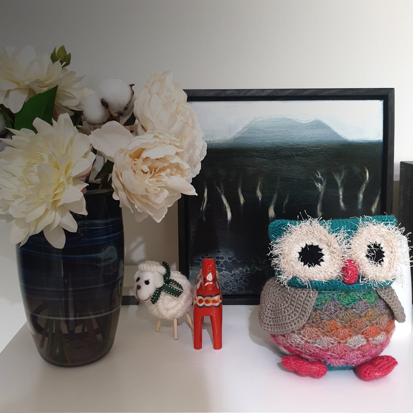 Colourful, cuddly crocheted toy Owl